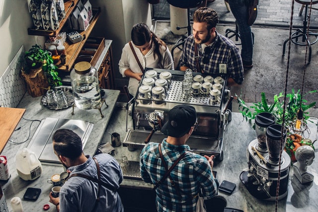 Image Source Alt text: Customers ordering at coffee shop